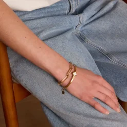 Manfield Goudkleurige bangle armband^ Sieraden