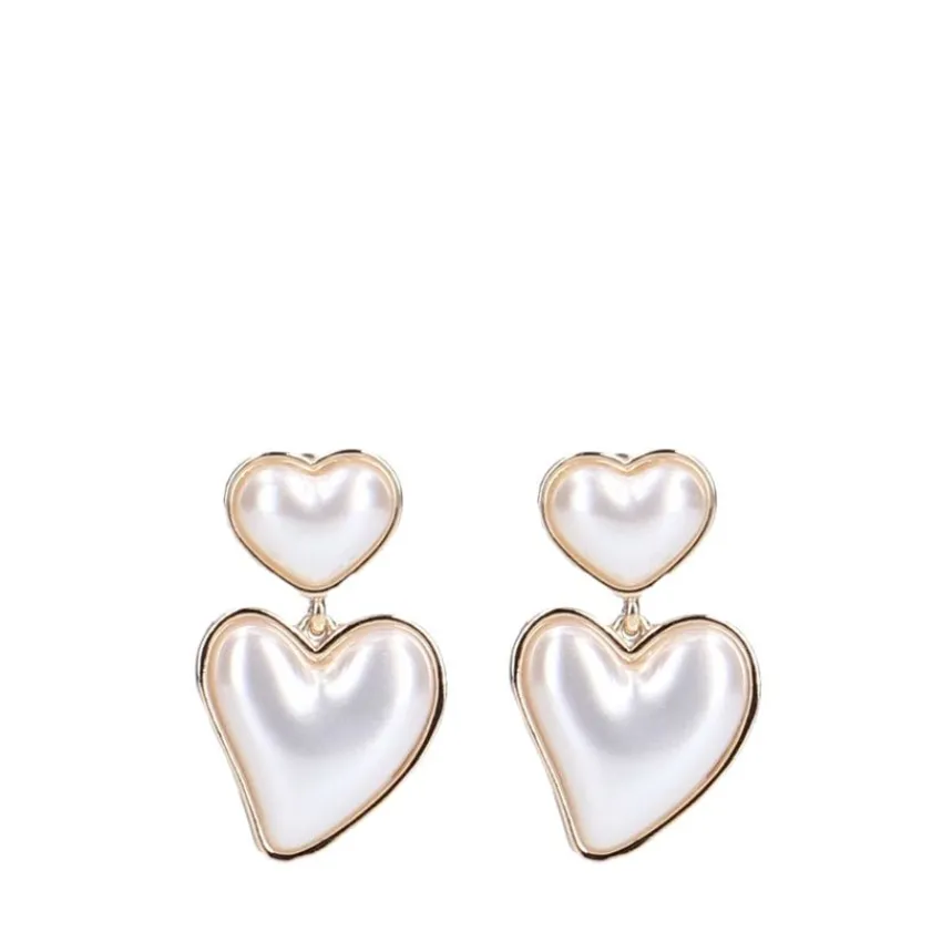 Manfield Goudkleurige hartjes oorbellen met parels^ Sieraden