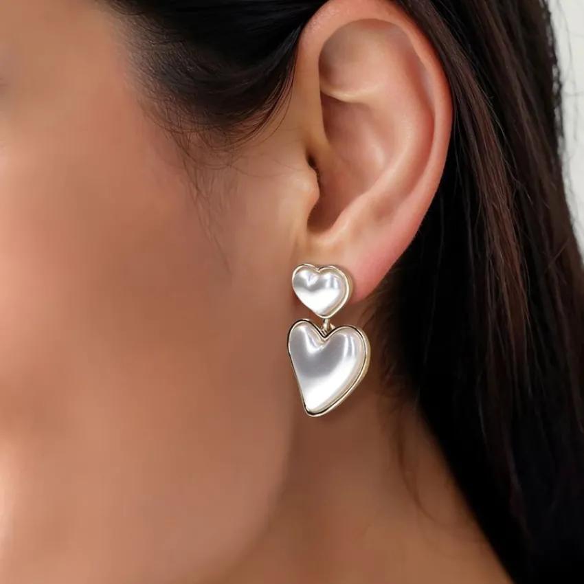 Manfield Goudkleurige hartjes oorbellen met parels^ Sieraden