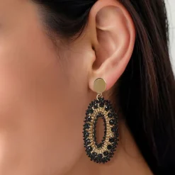 Manfield Zwarte kralen oorbellen met goudkleurige details^ Sieraden